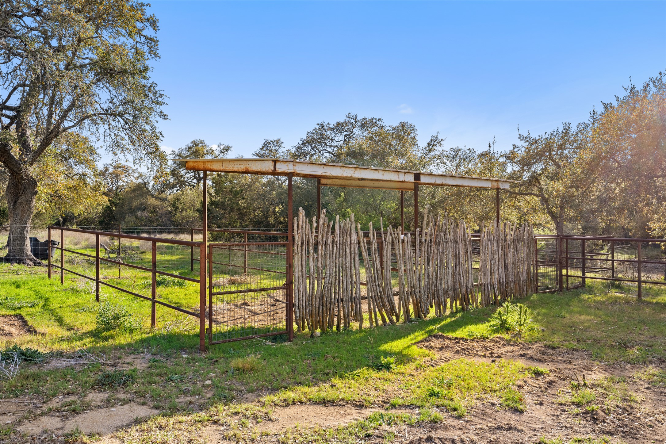 118 Landons Way Blanco, TX 78606 - Photo 31 of 32 a view of a backyard with a garden