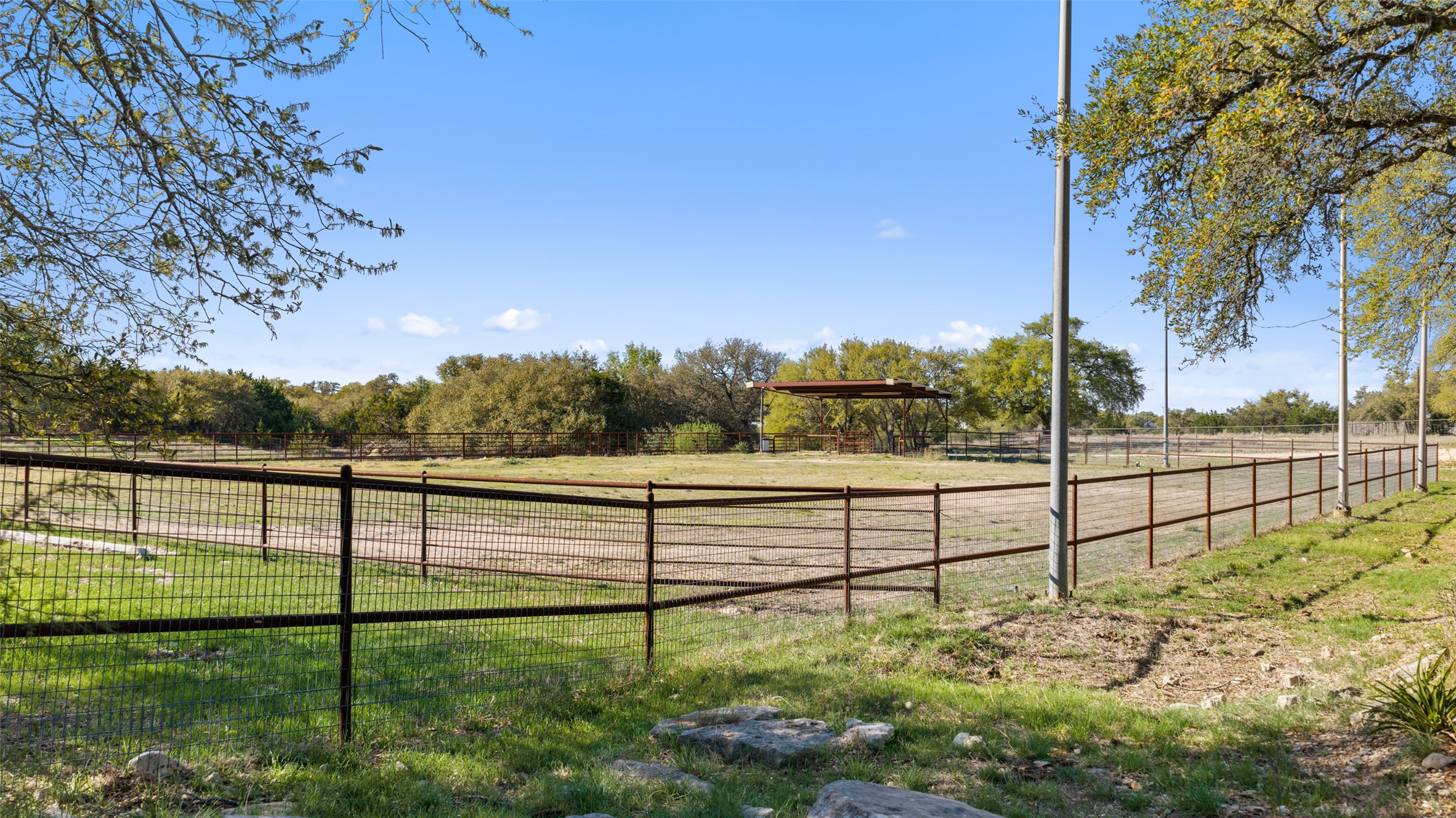 118 Landons Way Blanco, TX 78606 - Photo 9 of 32 a view of outdoor space with iron fence