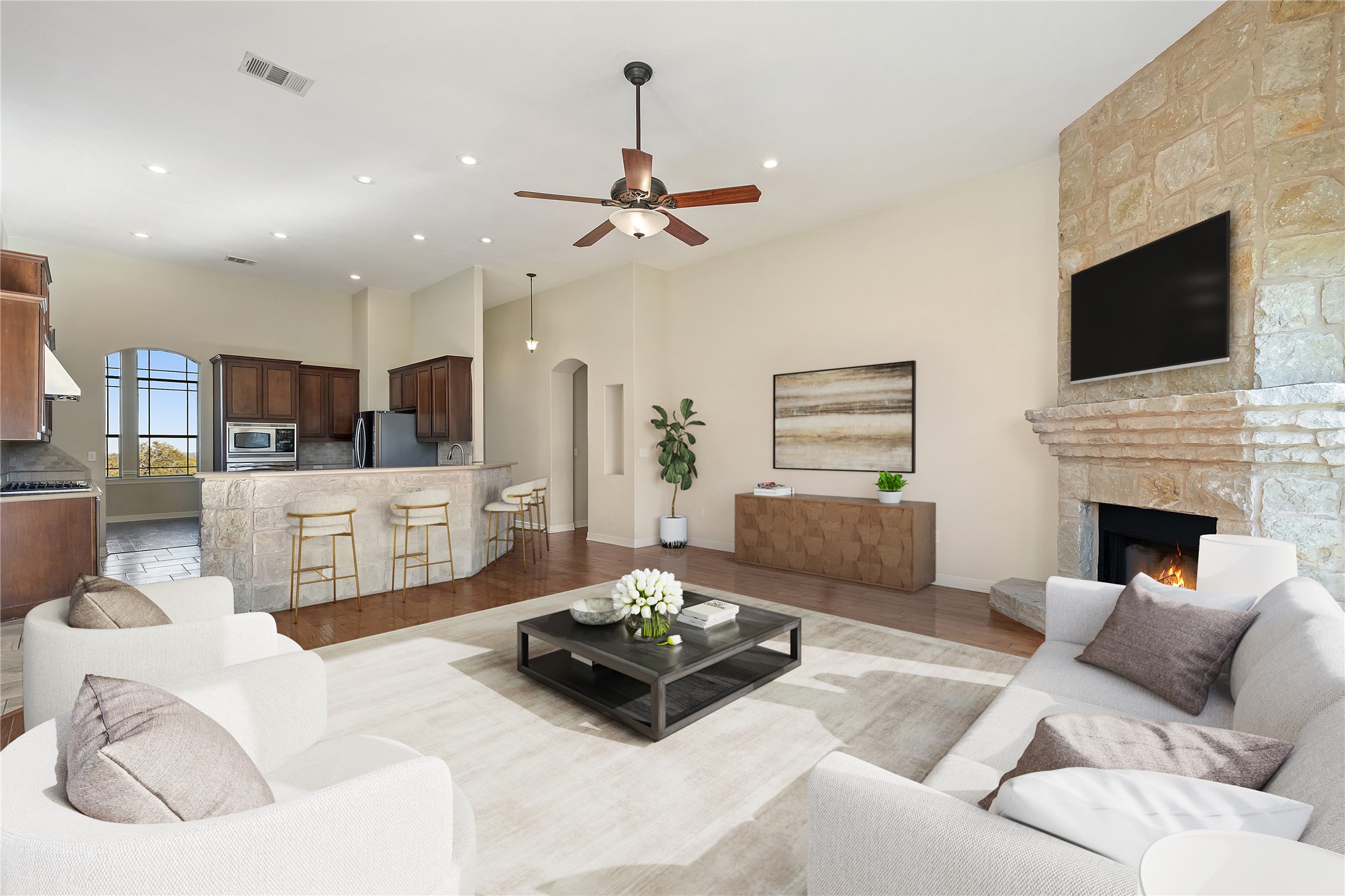 118 Landons Way Blanco, TX 78606 - Photo 10 of 32 a living room with furniture fireplace and flat screen tv
