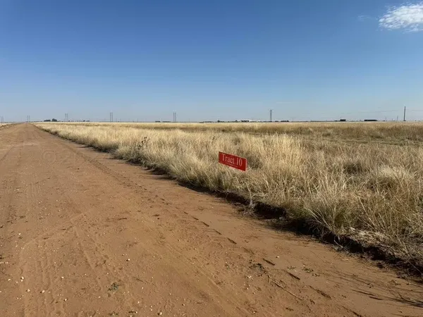 a view of a road with an outdoor space