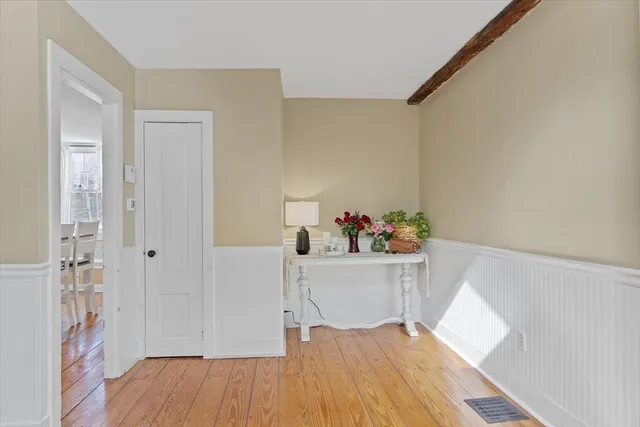 a view of dining room and wooden floor