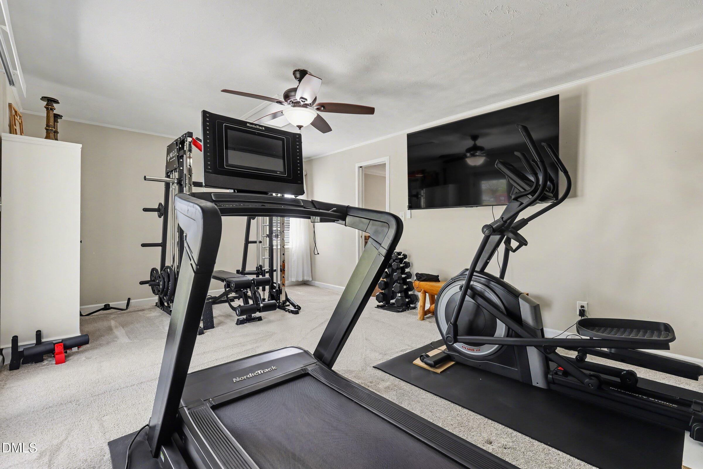 430 Fred Hall Road Stedman, NC 28391 - Photo 58 of 63 a view of a room with gym equipment