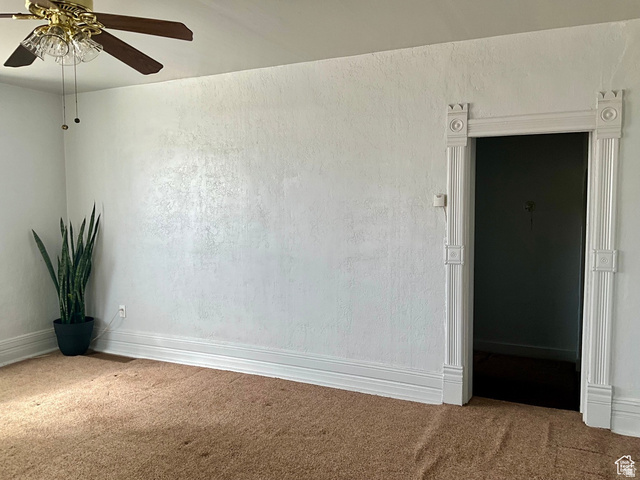 495 North Main Street Beaver, UT 84713 - Photo 17 of 18 Spare room with ceiling fan and carpet floors