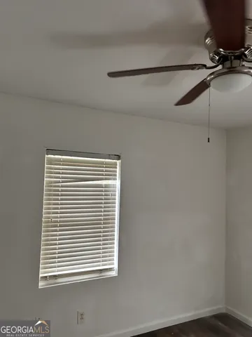 a view of a room that has a window in it