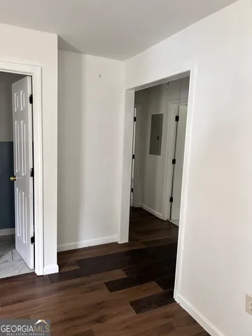 a bathroom with a sink a mirror and a toilet