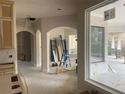 a view of a livingroom with furniture and front door