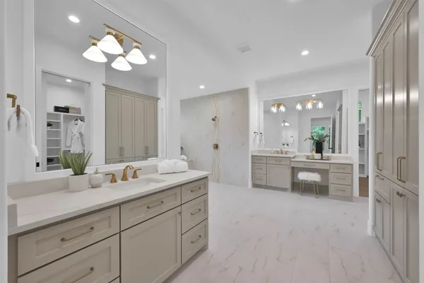 a bathroom with a double vanity sink and a mirror