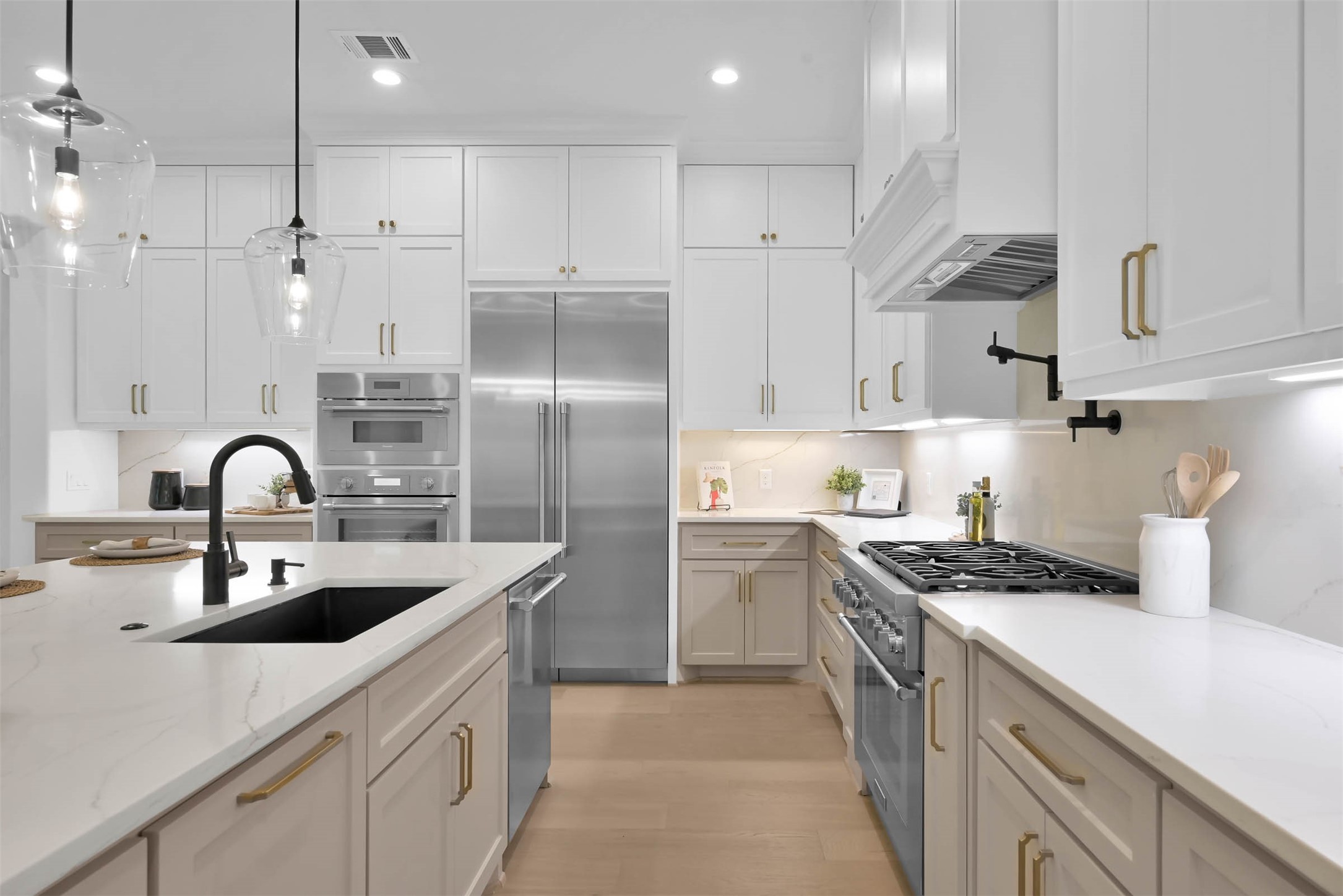2437 Old Ranch Road Montgomery, TX 77316 - Photo 10 of 11 a kitchen with kitchen island stainless steel appliances a sink a stove and refrigerator