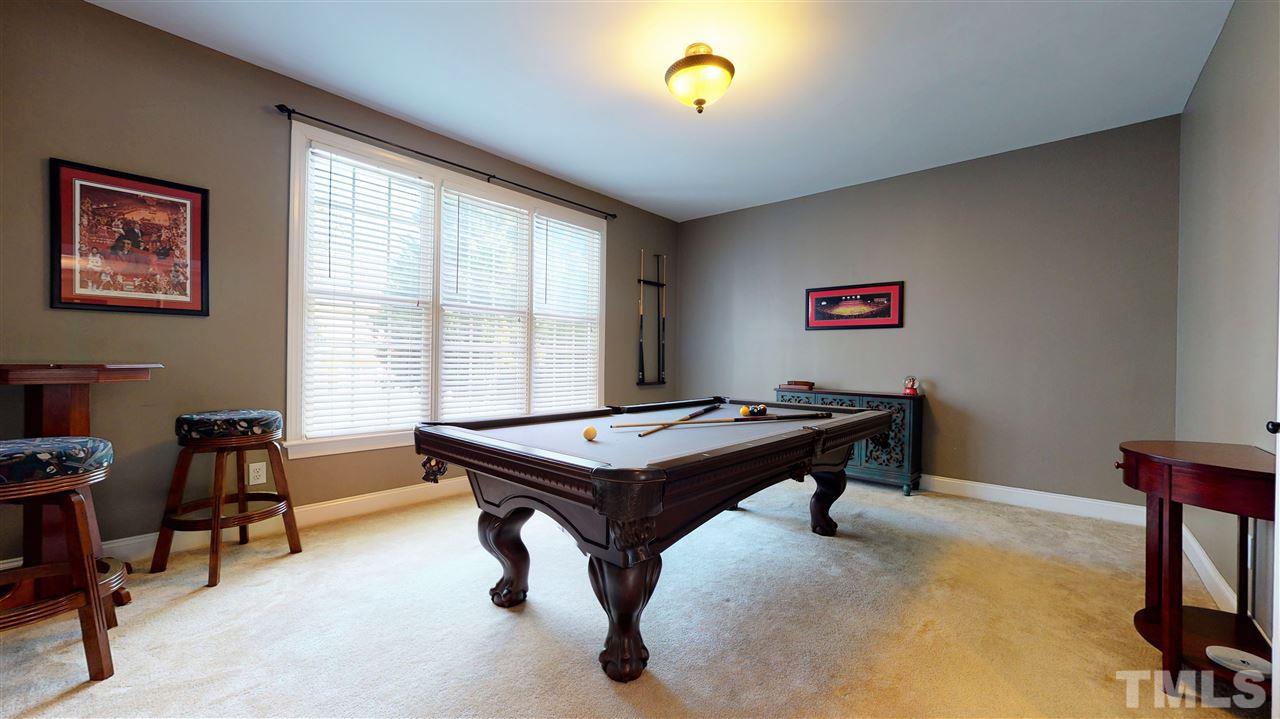 12820 Pegasi Way Raleigh, NC 27614 - Photo 22 of 30 a room with furniture pool table and windows