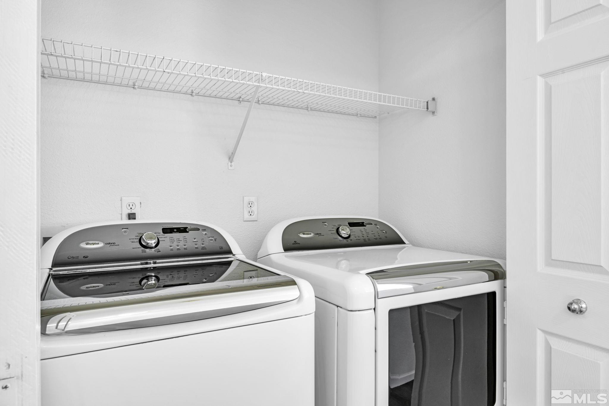 5869 September Circle Reno, NV 89523 - Photo 19 of 21 a utility room with dryer and washer