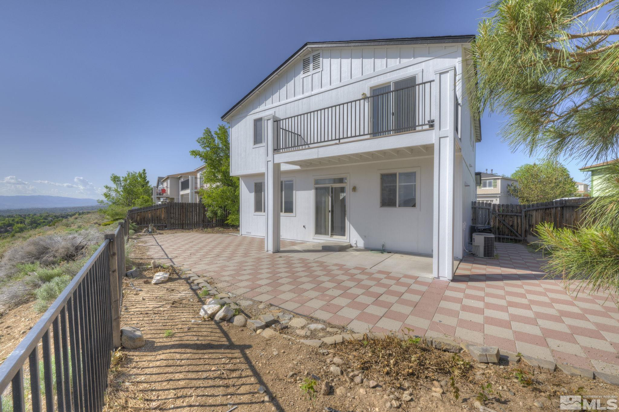 5869 September Circle Reno, NV 89523 - Photo 2 of 21 a view of a house with a yard