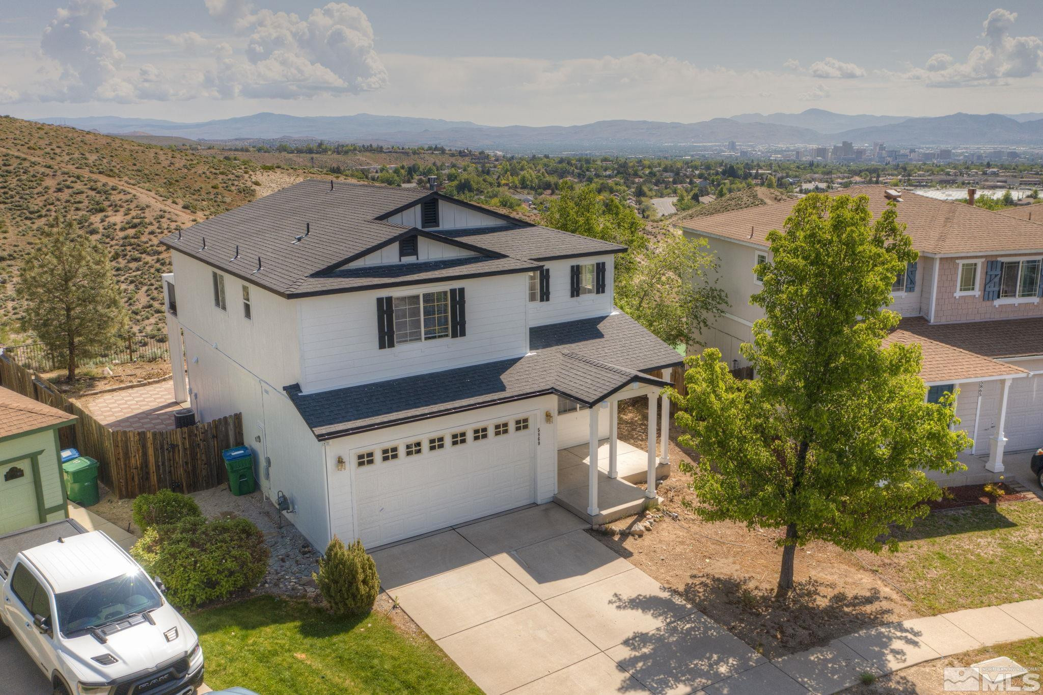 5869 September Circle Reno, NV 89523 - Photo 3 of 21 an aerial view of a house with a garden