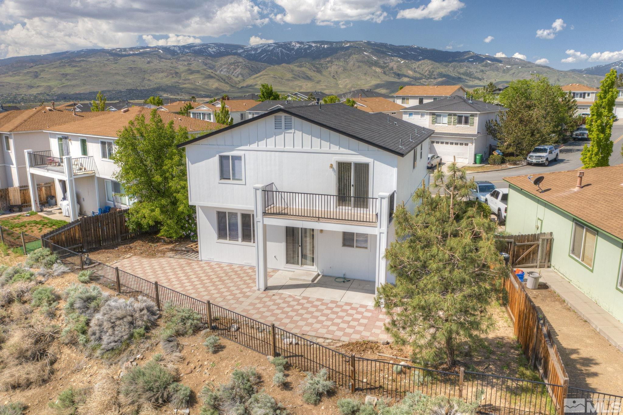 5869 September Circle Reno, NV 89523 - Photo 5 of 21 a front view of a house with a yard