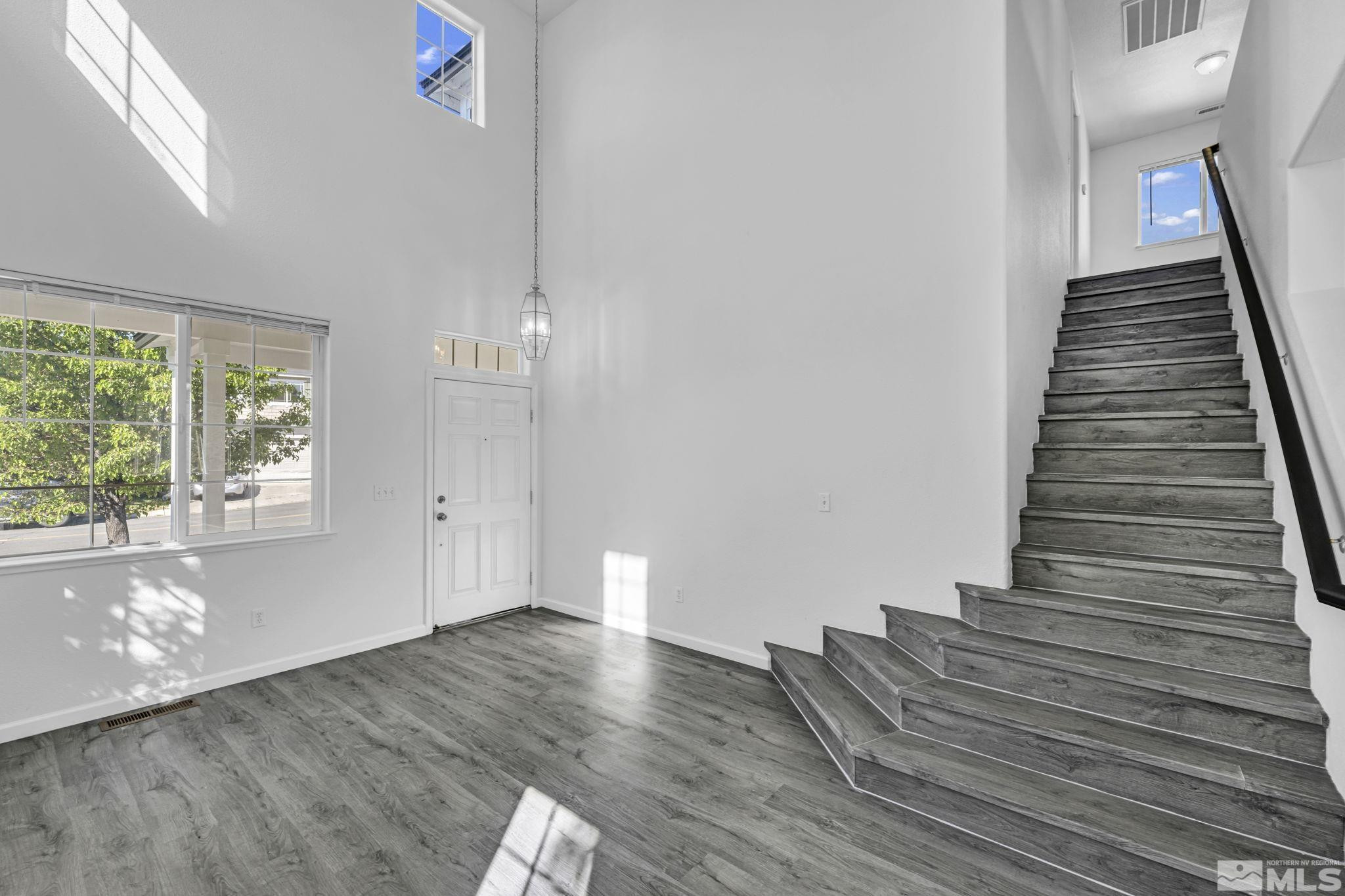 5869 September Circle Reno, NV 89523 - Photo 7 of 21 a view of entryway and hall with wooden floor