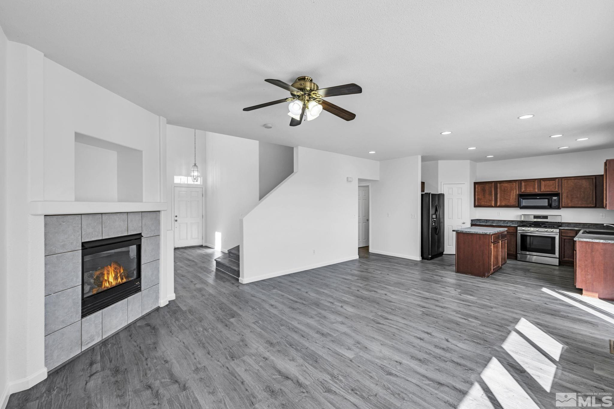 5869 September Circle Reno, NV 89523 - Photo 8 of 21 a view of a kitchen and a fireplace