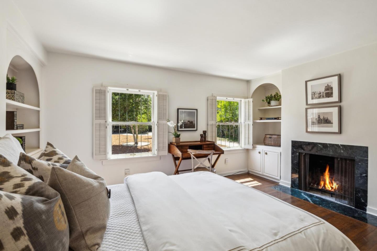 401 San Bernabe Drive Monterey, CA 93940 - Photo 34 of 65 a living room with furniture a window and a fireplace