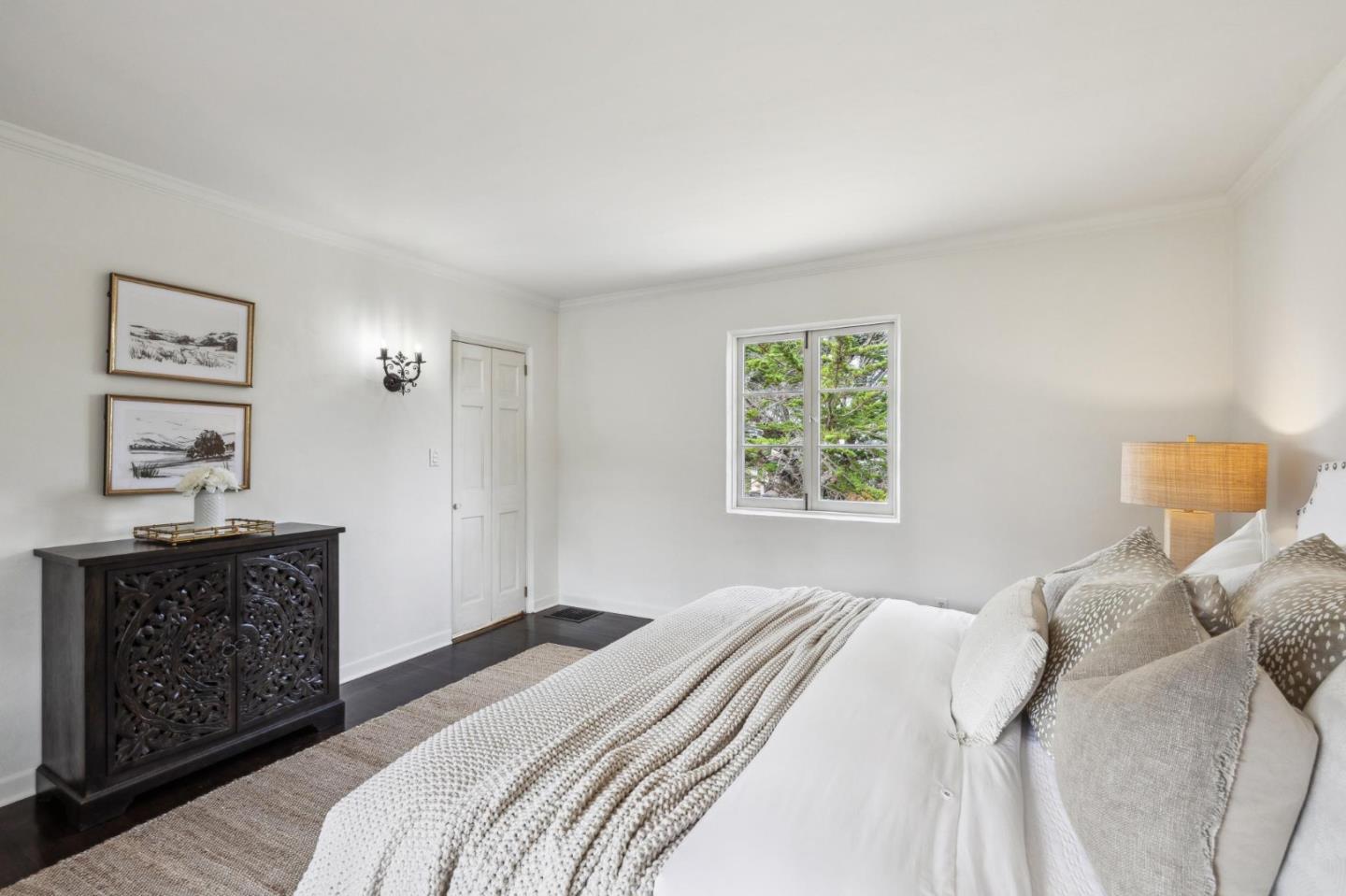 401 San Bernabe Drive Monterey, CA 93940 - Photo 54 of 65 a bedroom with a bed and a dresser