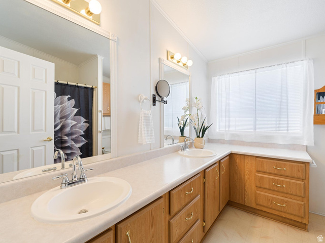 3941 West 40 North Hurricane, UT 84737 - Photo 24 of 55 Dual vanity with integrated sinks and chrome fixtures, complemented by a light-toned countertop