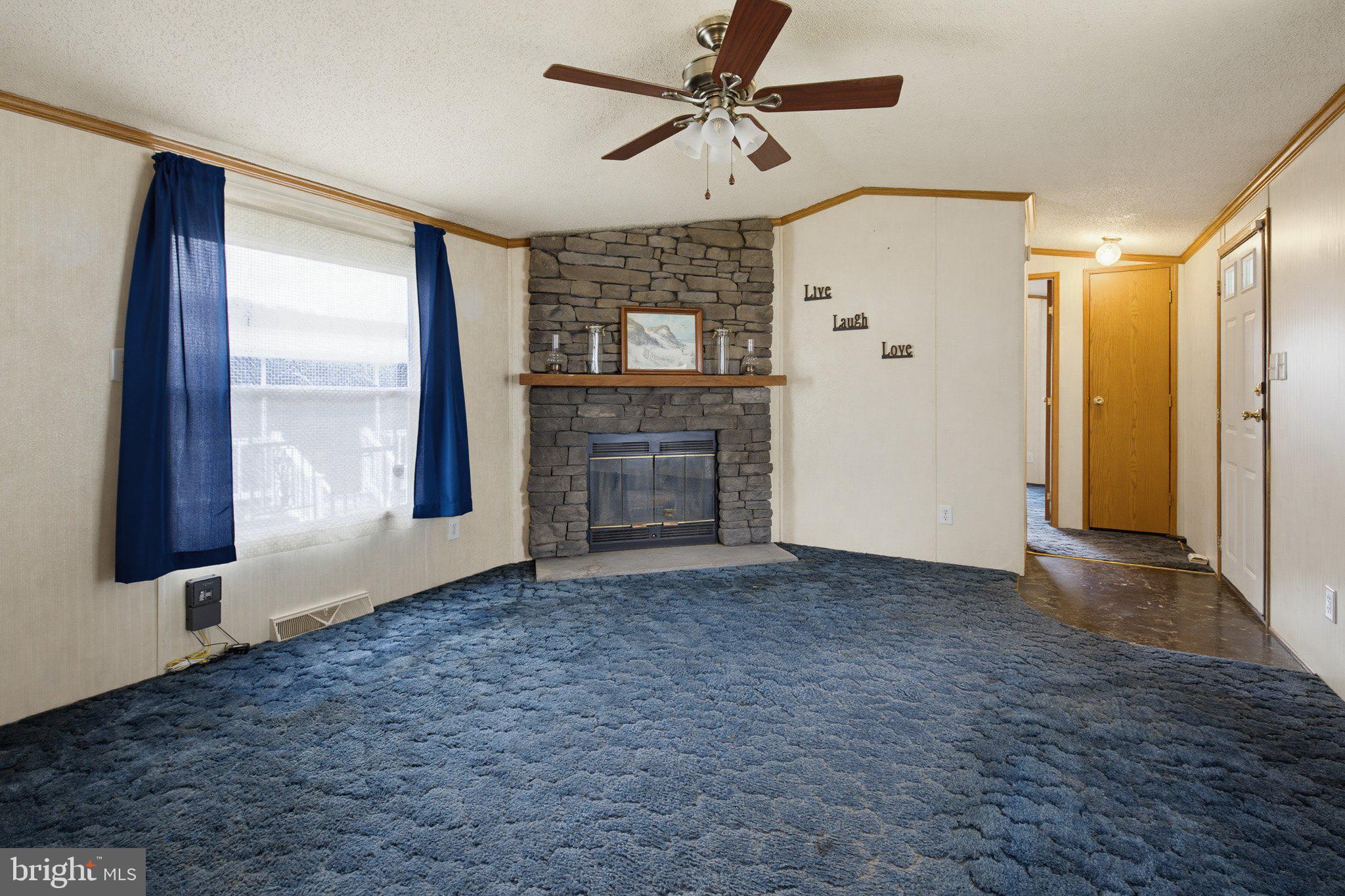 475 Wabash Road Ephrata, PA 17522 - Photo 10 of 33 Cozy living space with stone fireplace.