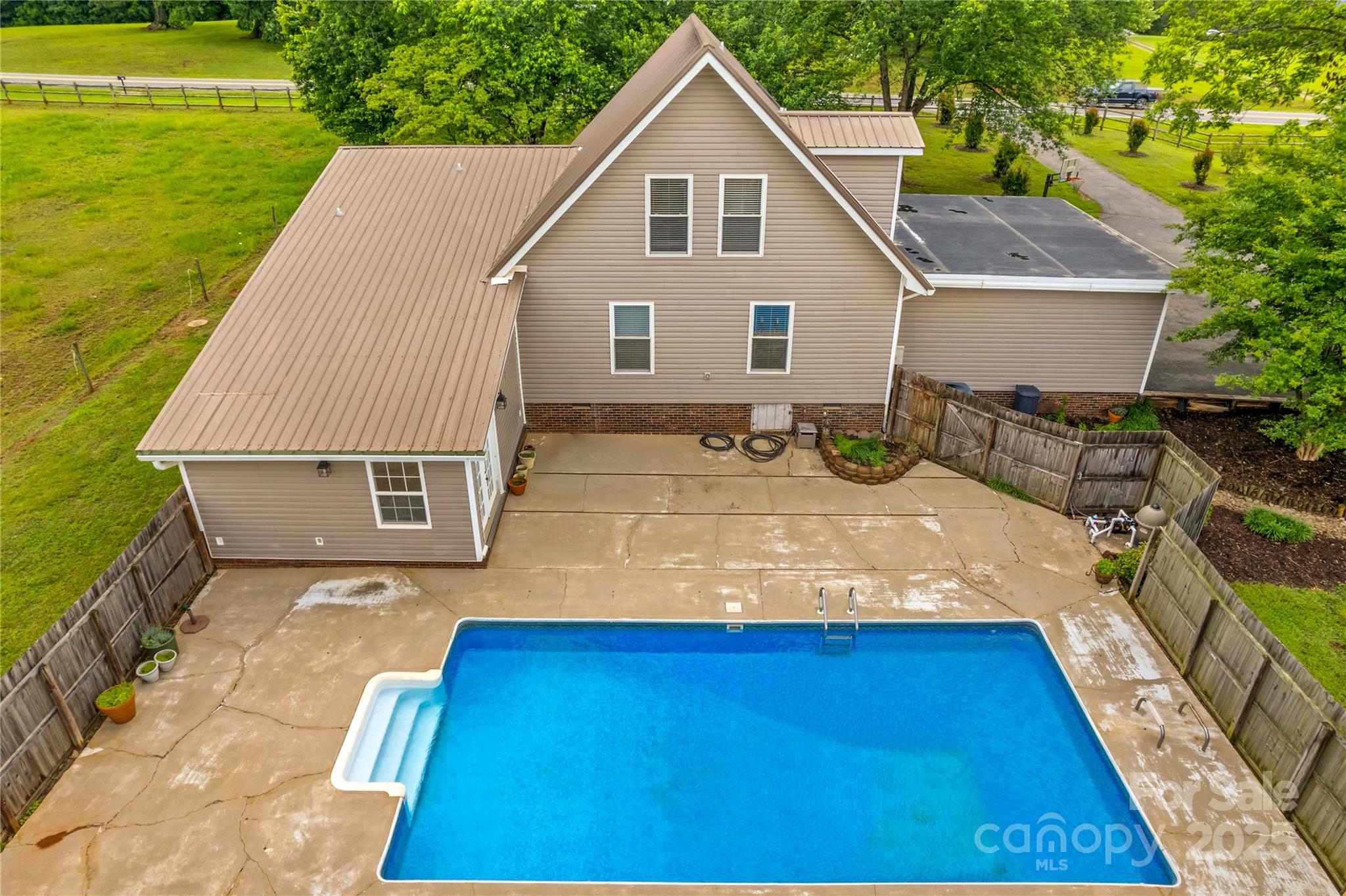 296 Hicks Creek Road Troutman, NC 28166 - Photo 27 of 48 a house view with a outdoor space