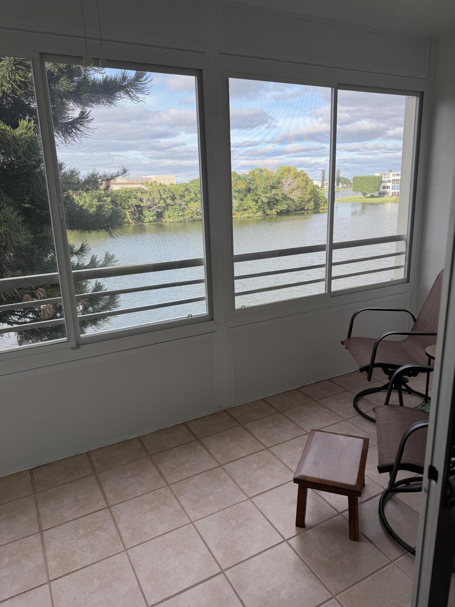 3062 Ainslie Drive Boca Raton, FL 33434 - Photo 16 of 27 a view of a room with furniture and window
