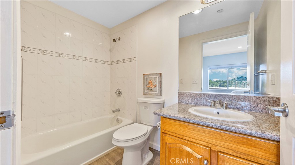 421 South Garfield Avenue, Unit 10 Monterey Park, CA 91754 - Photo 13 of 20 a bathroom with a granite countertop sink toilet and shower