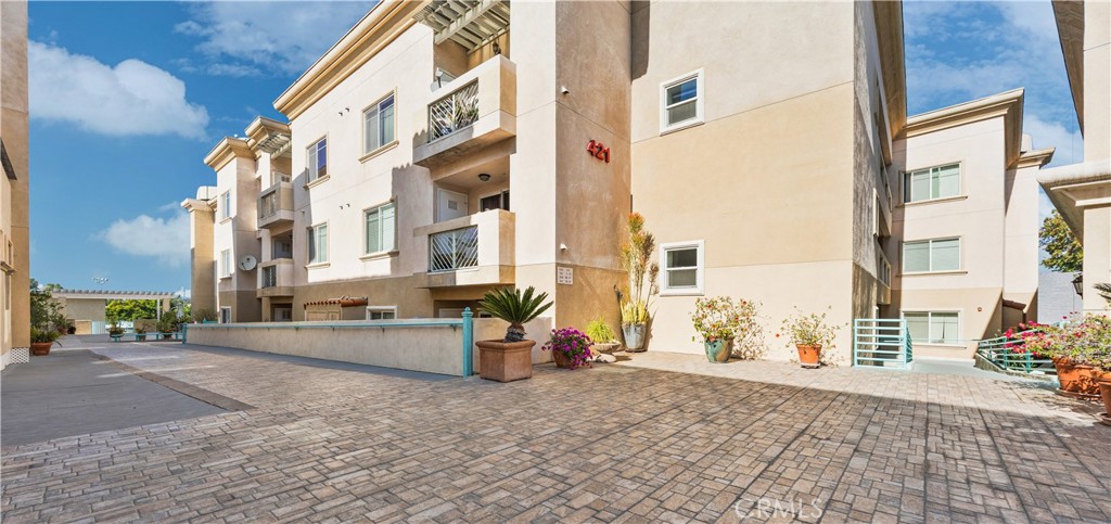421 South Garfield Avenue, Unit 10 Monterey Park, CA 91754 - Photo 2 of 20 a view of a city from a patio