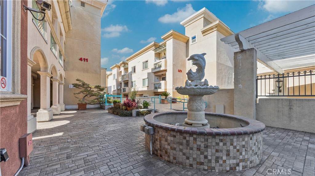 421 South Garfield Avenue, Unit 10 Monterey Park, CA 91754 - Photo 3 of 20 a view of a house with a bath tub and chair