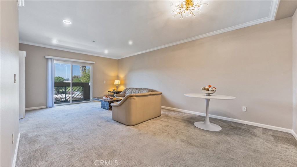 421 South Garfield Avenue, Unit 10 Monterey Park, CA 91754 - Photo 9 of 20 a room with furniture and a window