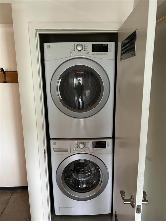 130 John Street, Unit 213 Lowell, MA 01852 - Photo 17 of 17 a utility room with dryer and washer
