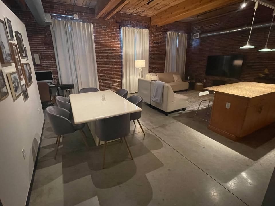 130 John Street, Unit 213 Lowell, MA 01852 - Photo 3 of 17 a view of a livingroom with furniture and window