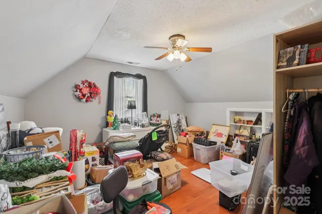 a view of a workspace with furniture and toys