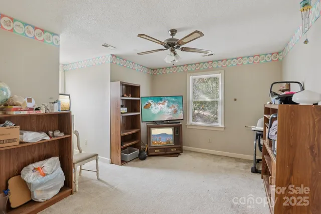 a room with furniture and window