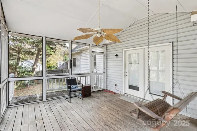 workspace with wooden floor and windows