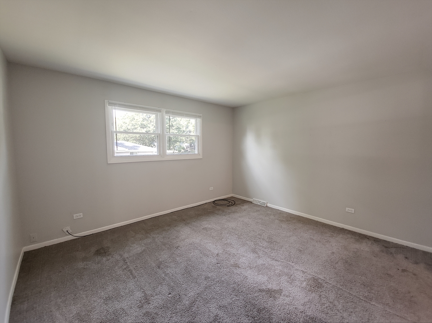 6037 Spring Lane Matteson, IL 60443 - Photo 13 of 29 an empty room with windows