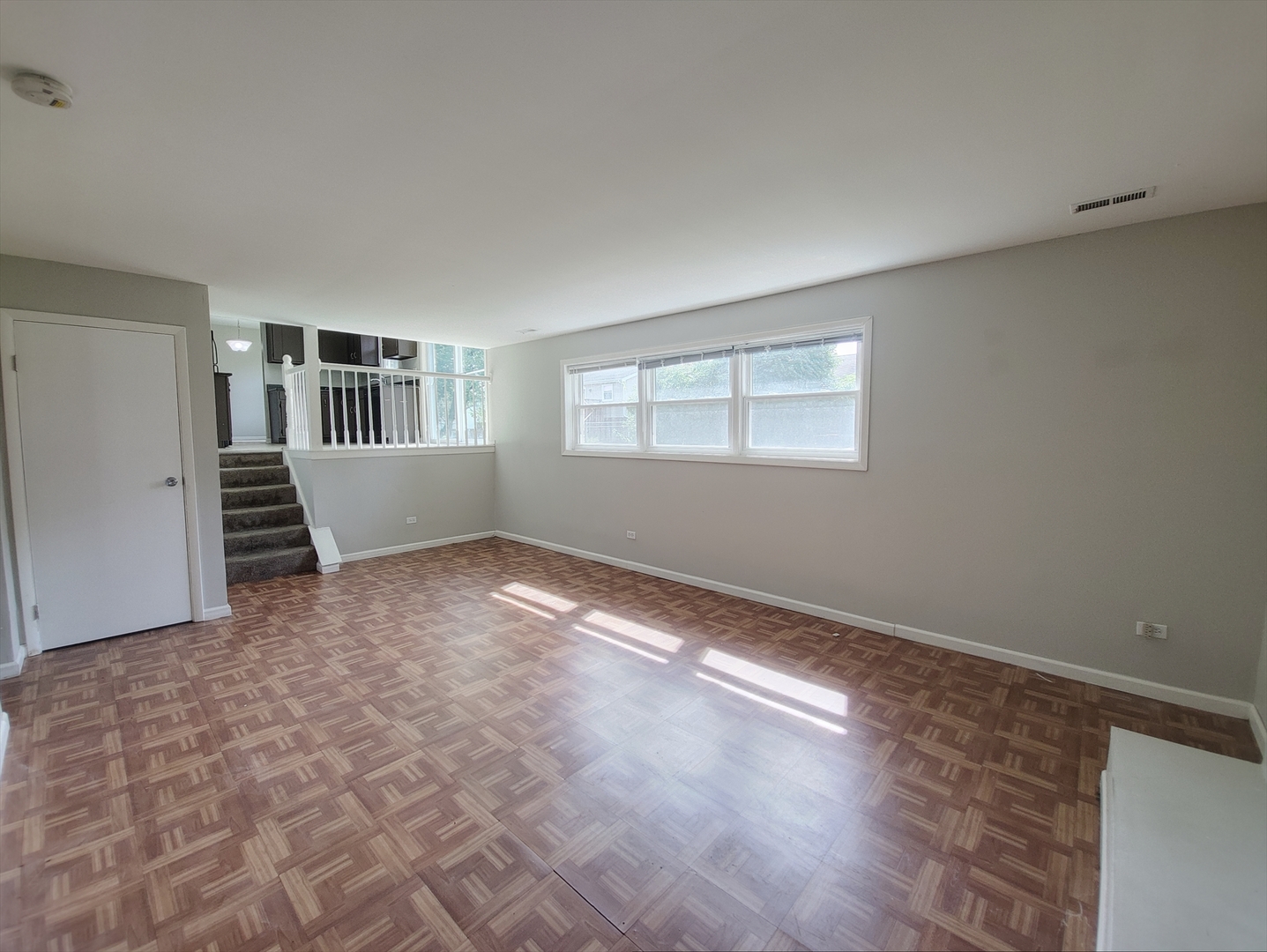 6037 Spring Lane Matteson, IL 60443 - Photo 9 of 29 an empty room with windows