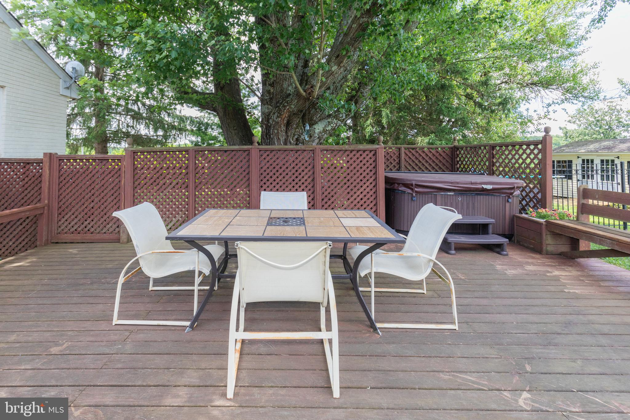 22520 Peach Tree Road Boyds, MD 20841 - Photo 41 of 50 Spacious deck includes a hot tub