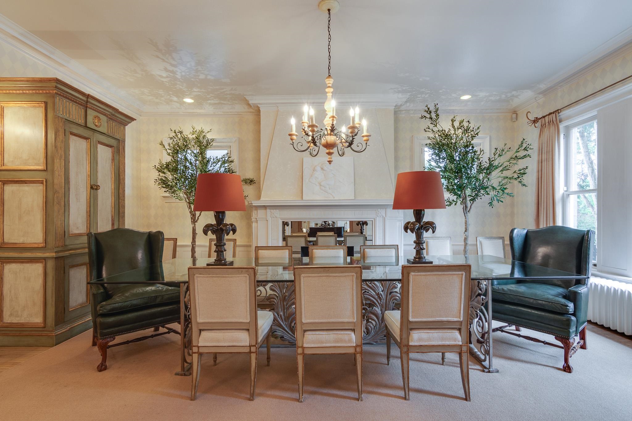 2221 Poplar Avenue Memphis, TN 38104 - Photo 13 of 40 a view of a dining room with furniture and a chandelier