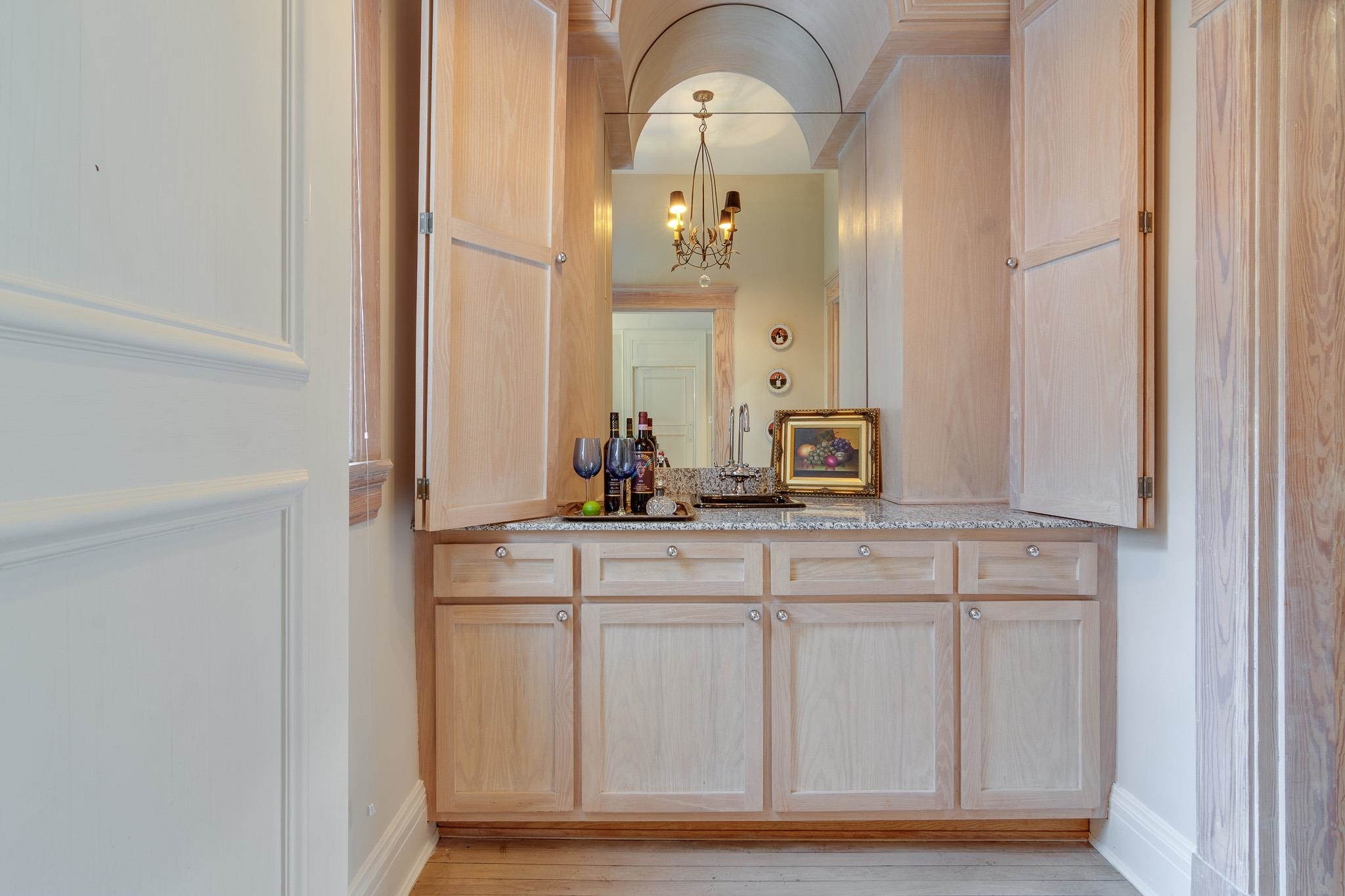 2221 Poplar Avenue Memphis, TN 38104 - Photo 10 of 40 a bathroom with a sink and a mirror