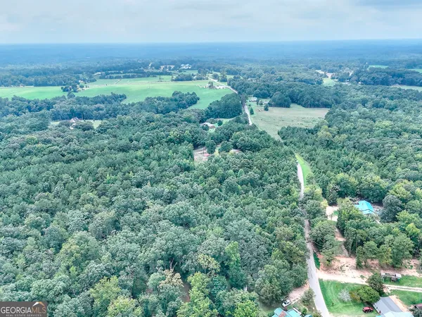 an aerial view of a city and mountain view