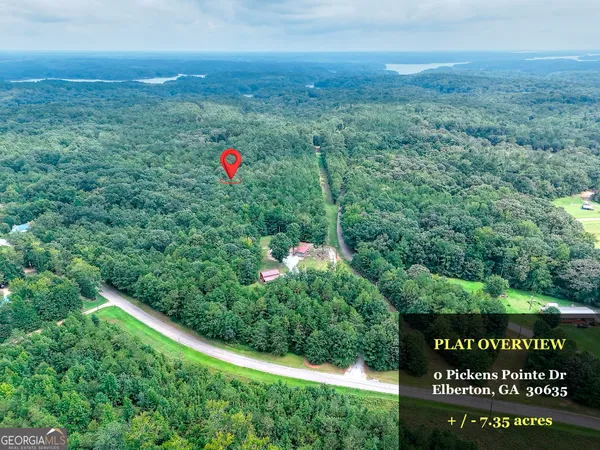 a view of a field with an outdoor space