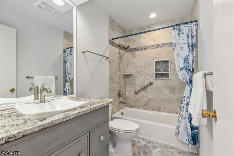 71 Sliker Road Glen Gardner, NJ 08826 - Photo 18 of 50 a bathroom with a granite countertop sink toilet and shower