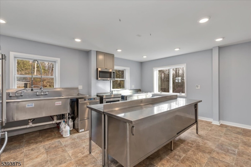 71 Sliker Road Glen Gardner, NJ 08826 - Photo 23 of 50 a kitchen with counter top space and windows