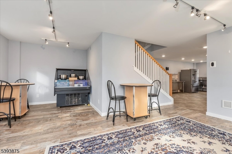 71 Sliker Road Glen Gardner, NJ 08826 - Photo 26 of 50 a living room with furniture and a flat screen tv