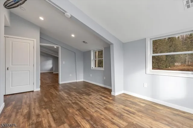 a view of an empty room and window