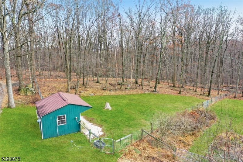 71 Sliker Road Glen Gardner, NJ 08826 - Photo 36 of 50 a front view of a house with garden