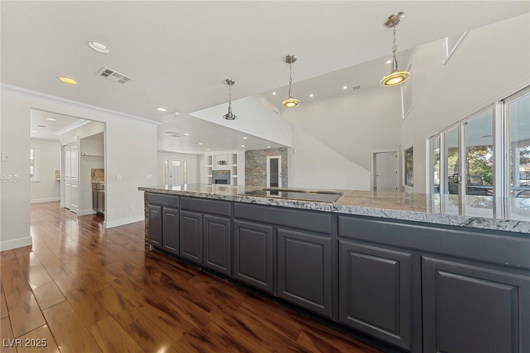 144 East Robindale Road Las Vegas, NV 89123 - Photo 12 of 48 U shaped kitchen with long dining bar.