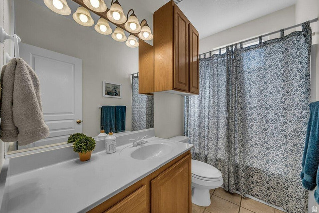 841 1010 S Street St. George, UT 84790 - Photo 17 of 33 Full bathroom with vanity and light tile patterned floors