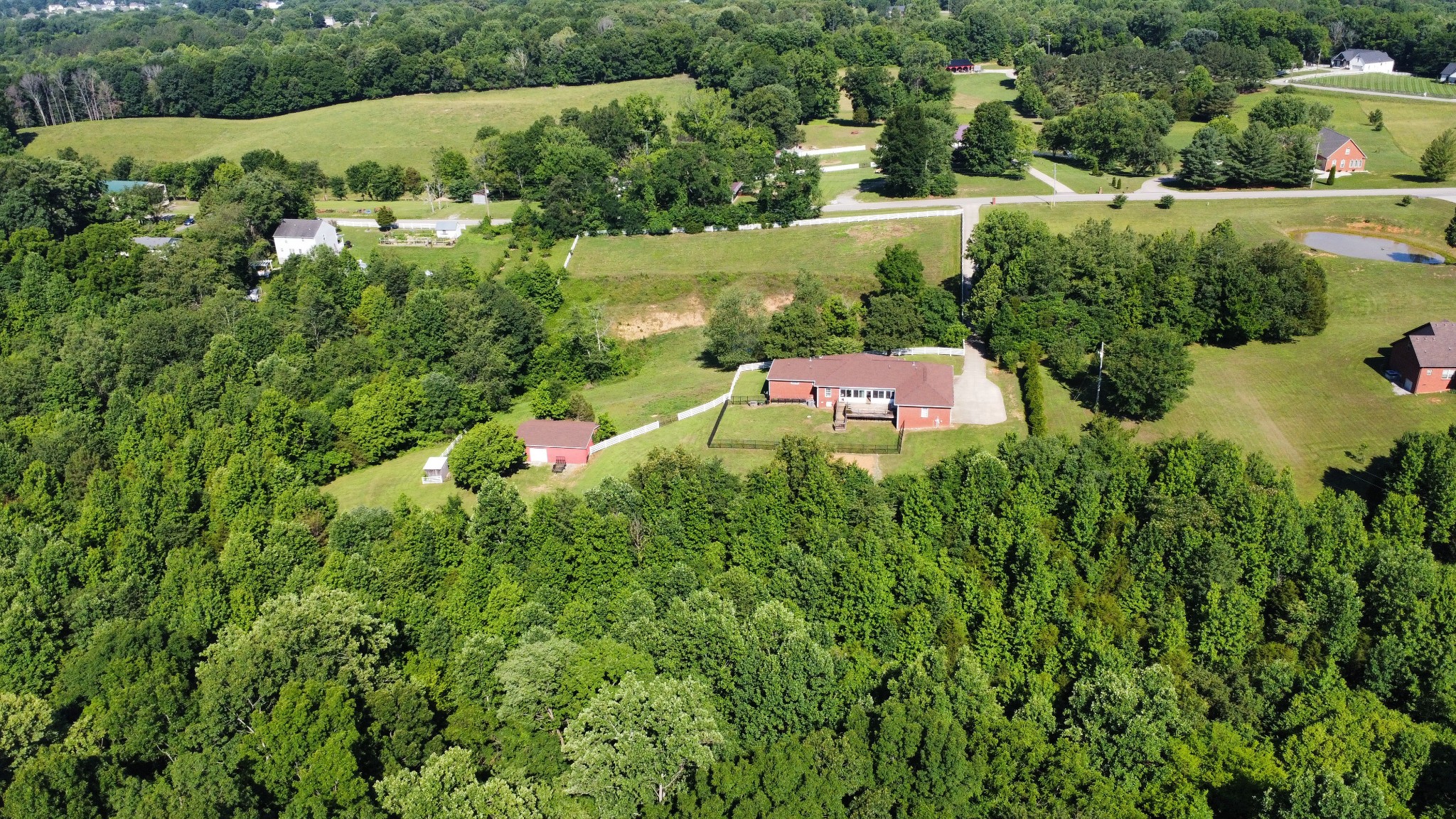 2251 Davidson Graveyard Road Clarksville, TN 37043 - Photo 75 of 78 an aerial view of residential houses with outdoor space and trees