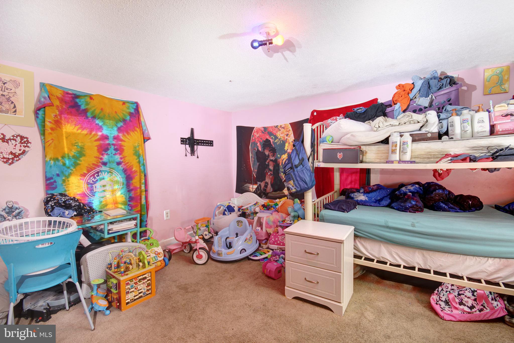 11 West Chestnut Street Delmar, MD 21875 - Photo 11 of 14 a bed room with a bed and a couch